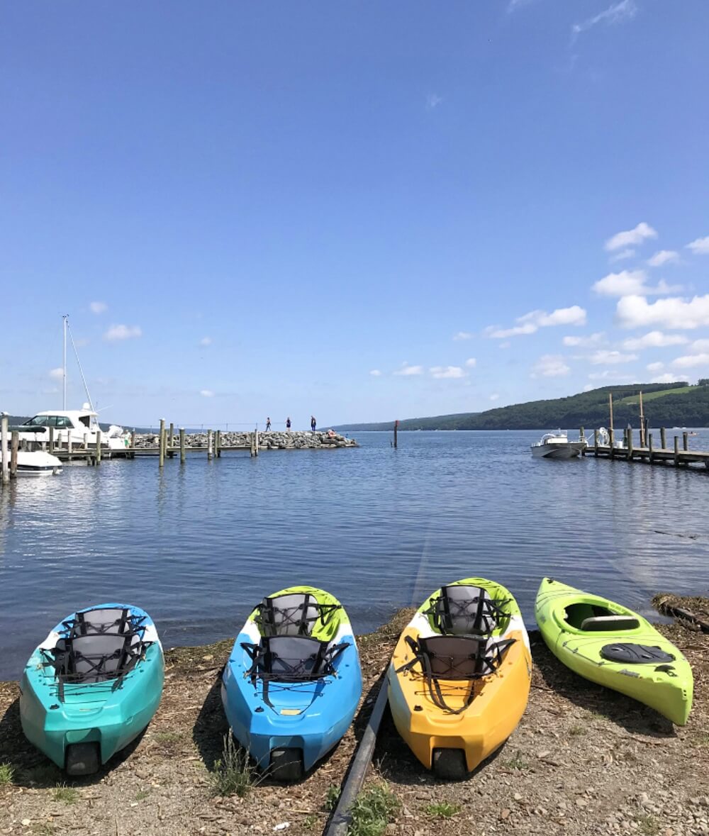 Kayaks on shore of Seneca Lake - Vacation FLX